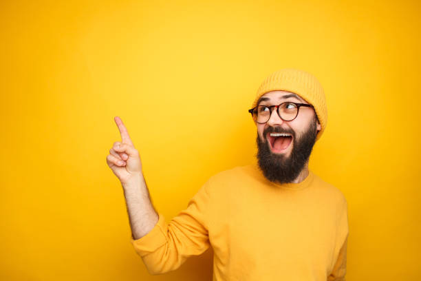 istock Stylish vivid man pointing away 1096522274