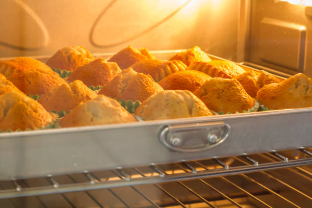 istock Banana muffin baking in hot oven 1096527886