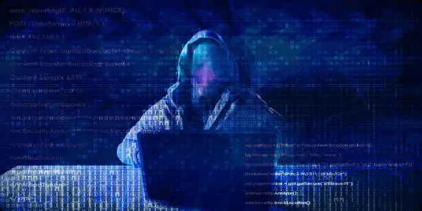 Hacker in Front of Computer Laptop Security Technology