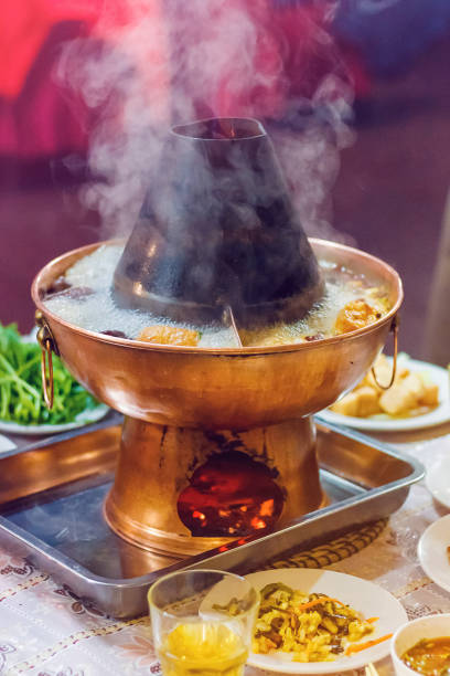 istock Double flavor hot pot on the table 1096531078