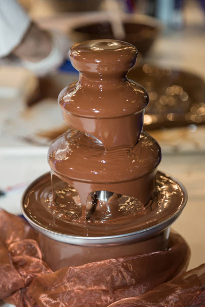 istock Professional Preparation of Melted Liquid Chocolate: Sweet Dessert 1096532576