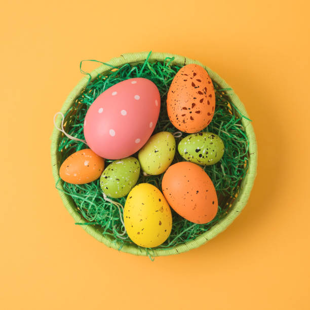 istock Easter holiday concept with easter eggs in basket decorations. 1096534884