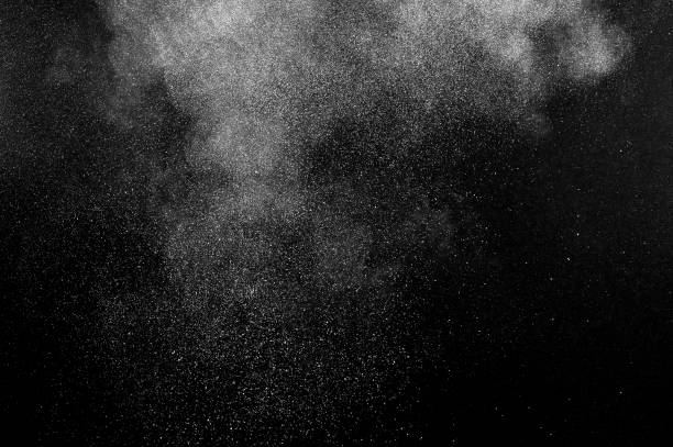 freeze motion of white particles on black background. - speed snow textured textured effect imagens e fotografias de stock