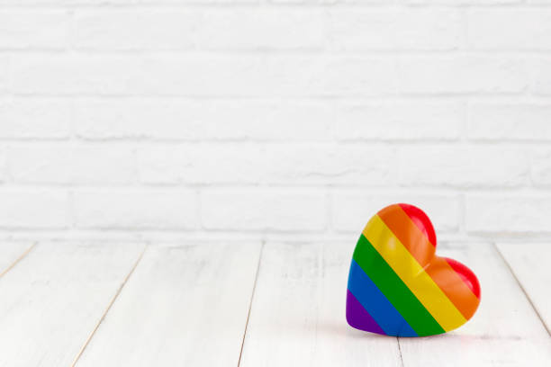 istock Rainbow heart shaped on white wood background with copy space 1096553102