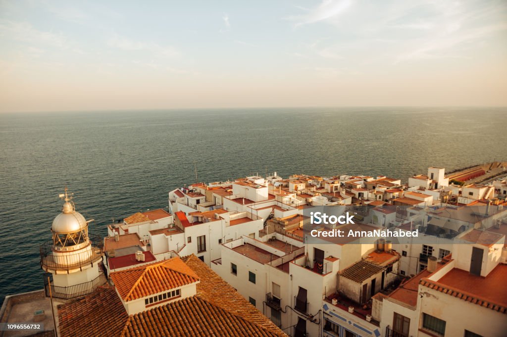 Beautiful sunset over Peniscola, city called the "Gibraltar of Valencia", south of Spain Architecture Stock Photo