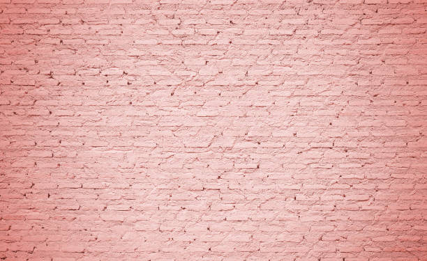 istock Coral color brick wall texture background 1096562572