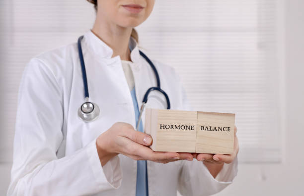 équilibre hormonal féminin, notion de gynécologie - hormone photos et images de collection