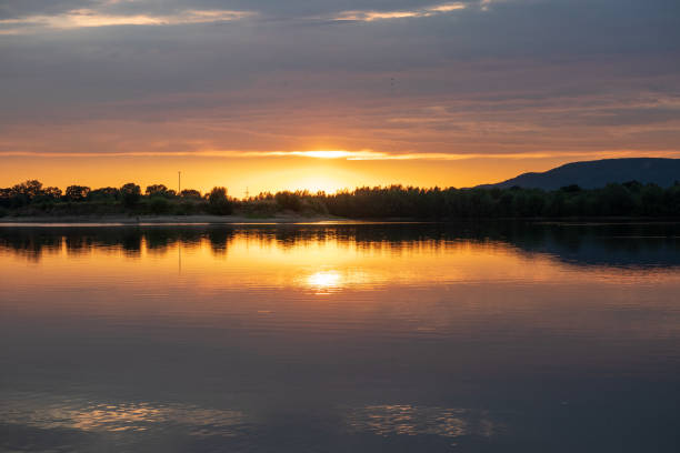 istock Sunset on a lake in Hohenrode in Germany 1096582150