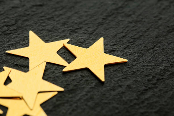 Golden stars on black background