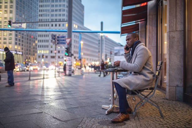 Successful young businessman enjoying his business trip to Berlin in winter season