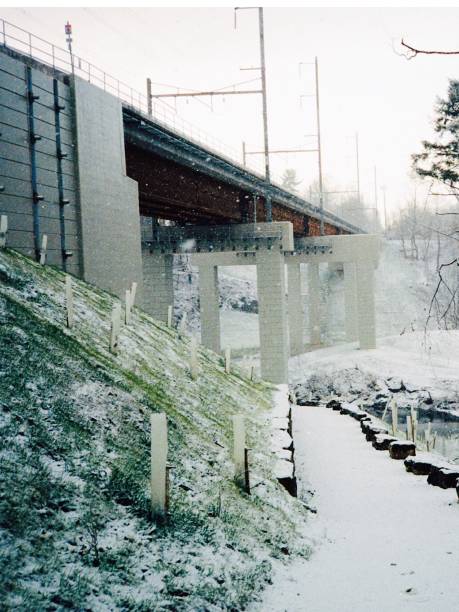 istock A bridge on a hill side in a snowstorm 1096604264