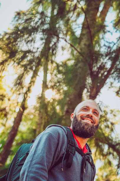 istock Man hiking in the woods, wilderness 1096608316