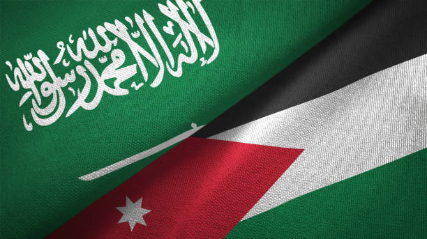 Jordan and Saudi Arabia two flags together textile cloth, fabric texture Jordan and Saudi Arabia flags together textile cloth, fabric texture government large currency finance stock pictures, royalty-free photos & images