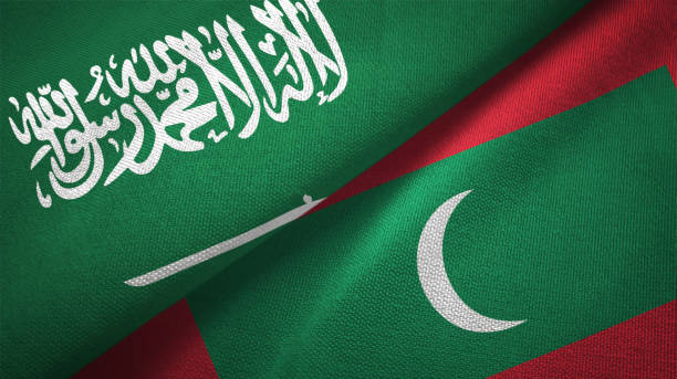 istock Maldives and Saudi Arabia two flags together textile cloth, fabric texture 1096609138