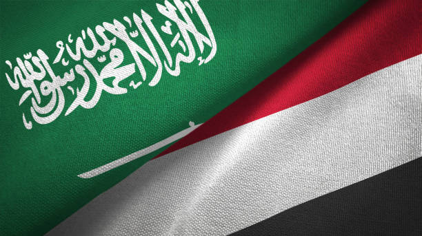 istock Yemen and Saudi Arabia two flags together textile cloth, fabric texture 1096609332