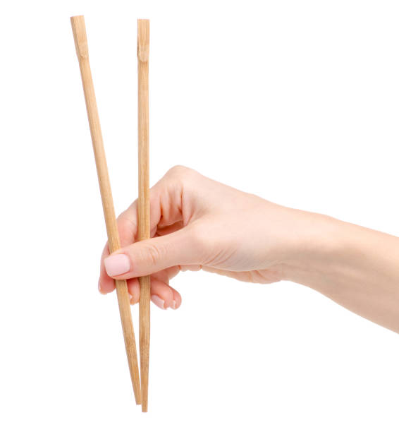 istock Sushi sticks asian in hand 1096610052