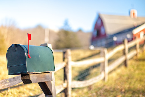American mailbox. rural view, blurred background