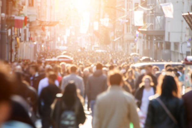 istock Blurred crowd of unrecognizable at the street 1096620894