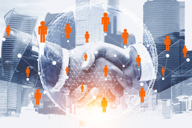 istock Handshake in gray city, people network 1096622980