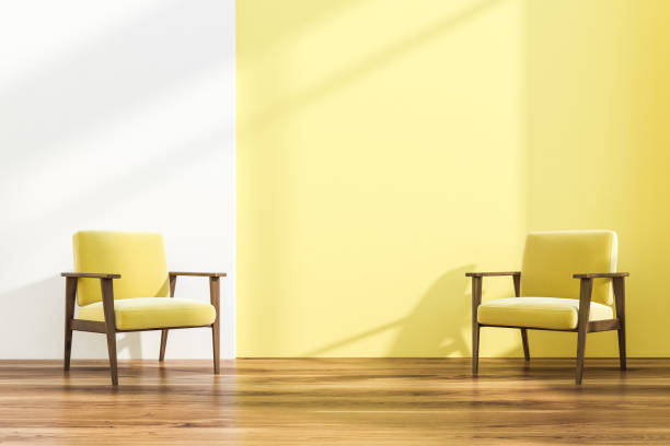 istock Two armchairs in white and yellow room 1096624330