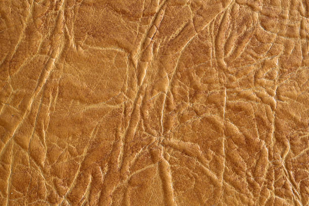 istock Brown textured leather background. Natural texture close-up. Useful as background for design-works. 1096624514