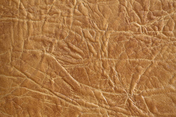 istock Brown textured leather background. Natural texture close-up. Useful as background for design-works. 1096624530