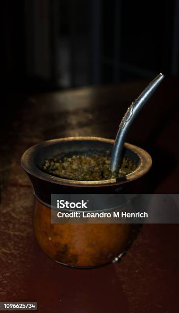 Gaucho Yerba Mate Tea The Chimarão Typical Brazilian Drink Traditionally In  A Cuiade Bombilla Stick Gourd Against Wooden Background Stock Photo -  Download Image Now - iStock