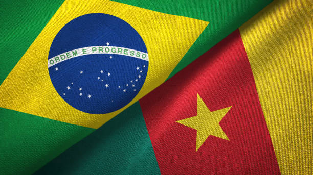 istock Cameroon and Brazil two flags together textile cloth, fabric texture 1096625840