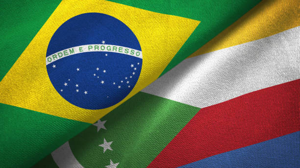 istock Comoros and Brazil two flags together textile cloth, fabric texture 1096625850