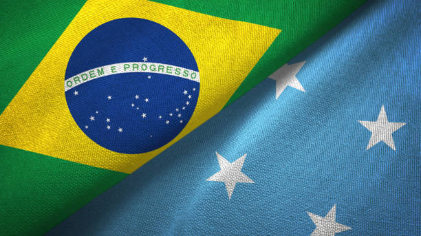 istock Micronesia and Brazil two flags together textile cloth, fabric texture 1096625972