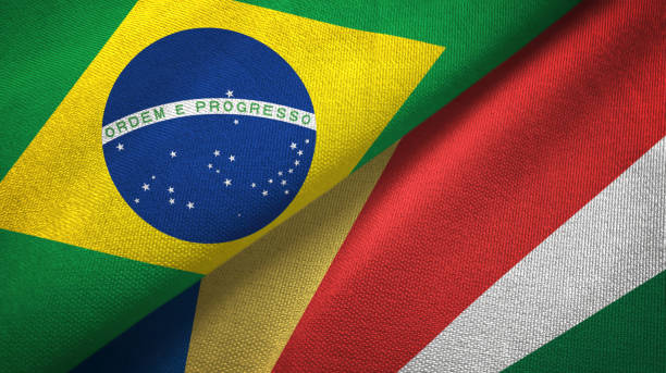 istock Seychelles and Brazil two flags together textile cloth, fabric texture 1096626060