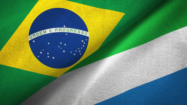istock Sierra Leone and Brazil two flags together textile cloth, fabric texture 1096626078