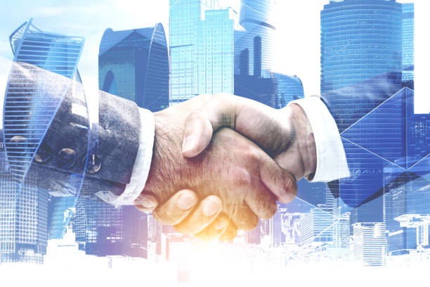 istock Handshake in blue Moscow city 1096626140