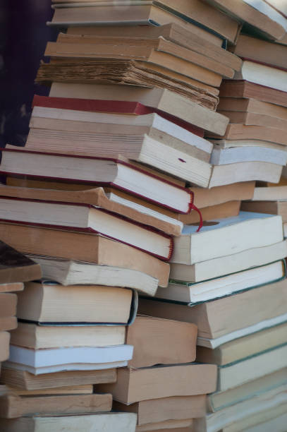 istock books pile in Bookstore 1096632512