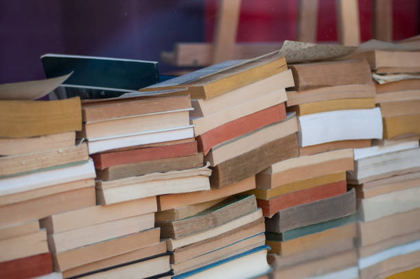 istock books pile in Bookstore 1096634998