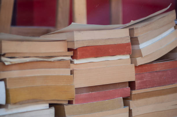 istock books pile in Bookstore 1096636120