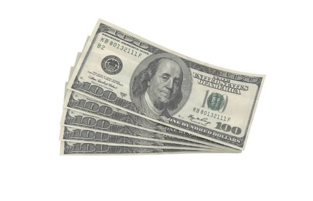istock 5 bills of $100 each over white background 1096644832