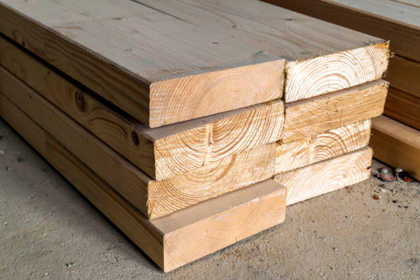 istock Stack of new wooden studs at the lumber yard. Wood timber construction material. Shallow depth of field effect 1096650646