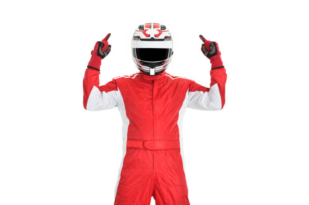 Cheerful race car driver Cheerful race car driver celebrating victory on a withe background race car driver stock pictures, royalty-free photos & images