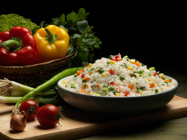 Sweet Corn, red bell pepper, green peas delicious healthy Risot stock photo