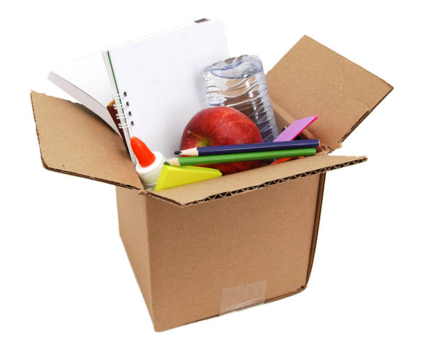 istock School and supplies stacking in box 1096665612