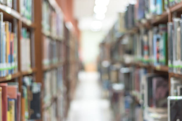 istock Blur school library or study room with book shelves for education background 1096694242