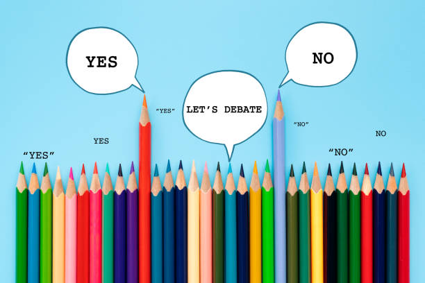 istock Debate, dialog, communication and education concept. color pencil talking about political opinions with speech bubbles 1096753608