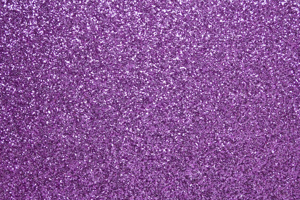 istock Sparkling macro photographed purple glitter abstract background 1096754096