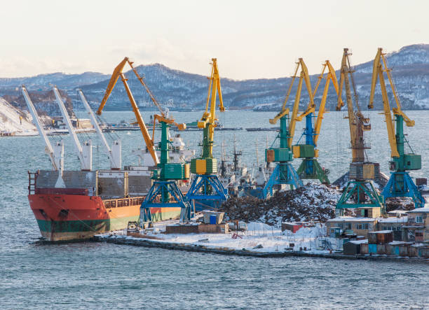 istock winter seaport with ships and cranes 1096754774