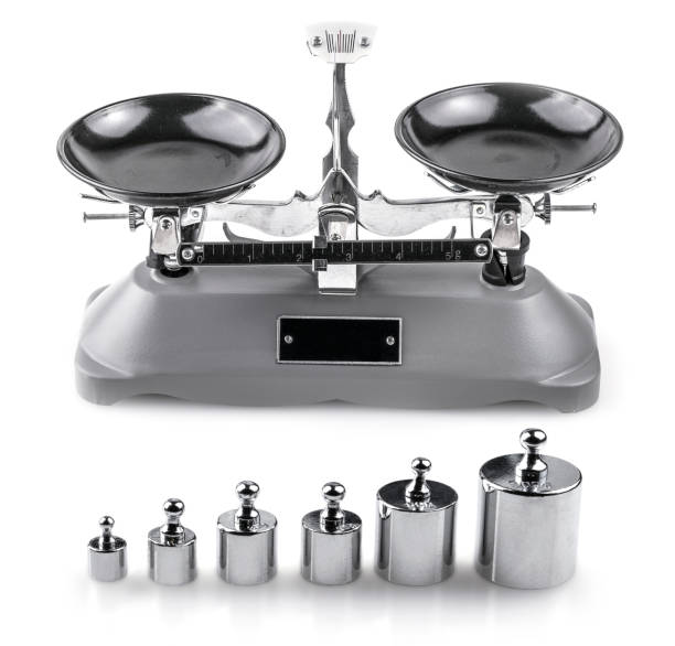 istock Gray Laboratory scales and weights on white 1096754864