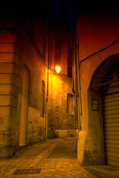 istock Old street at night with lantern at night 1096756394