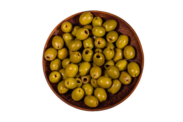 istock Ceramic plate with green olives isolated on a white background 1096758732
