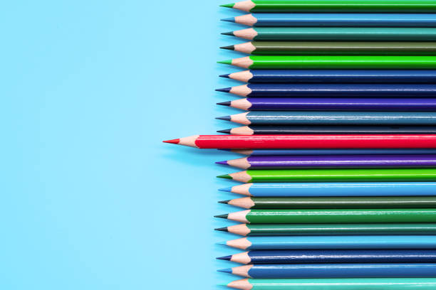 istock Red pencil standing out on blue background. Leadership, uniqueness, independence, initiative, strategy, dissent, think different, business concept 1096760846