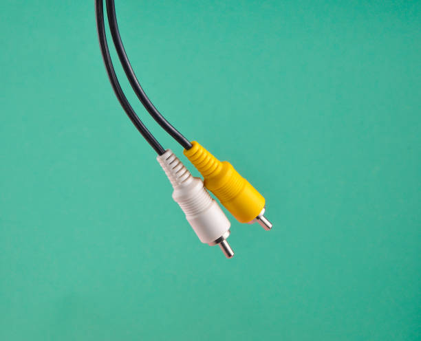 istock RCA yellow white audio/video cable on blue background 1096768854